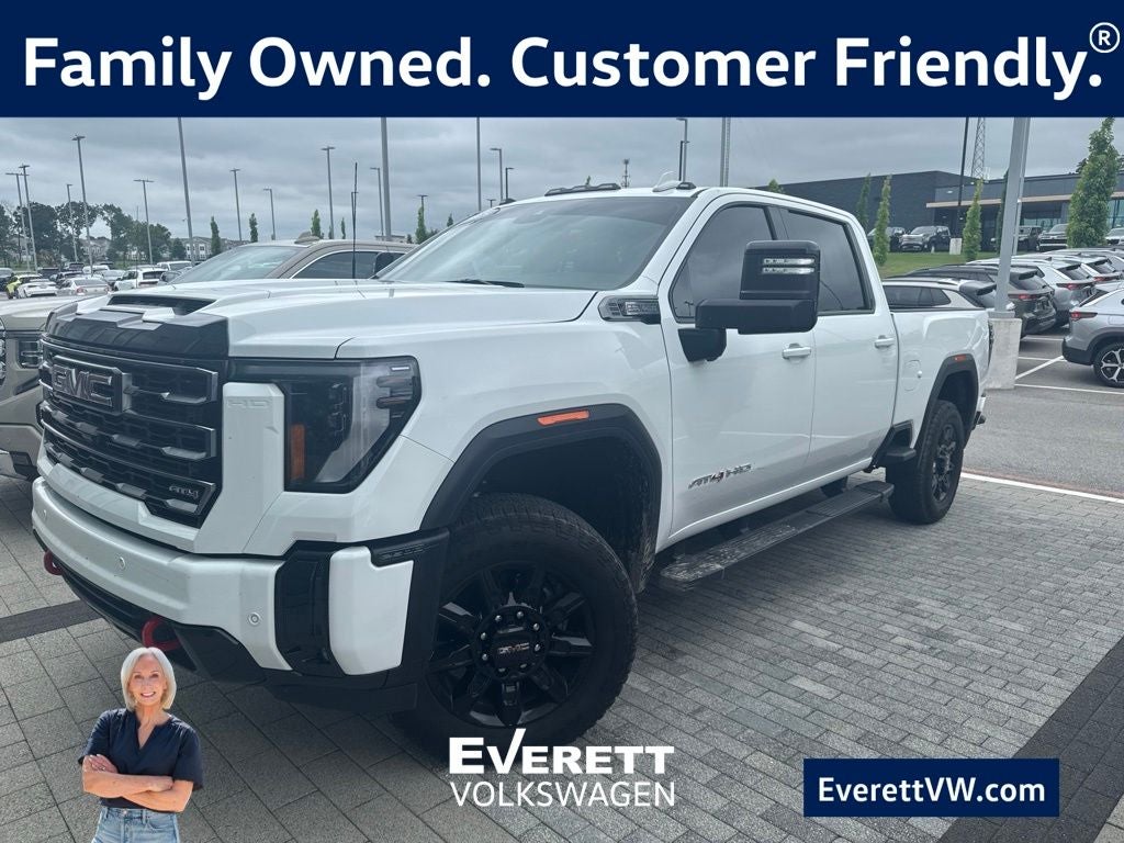 2026 GMC Sierra 2500HD AT4 in Summit White — front three-quarter view