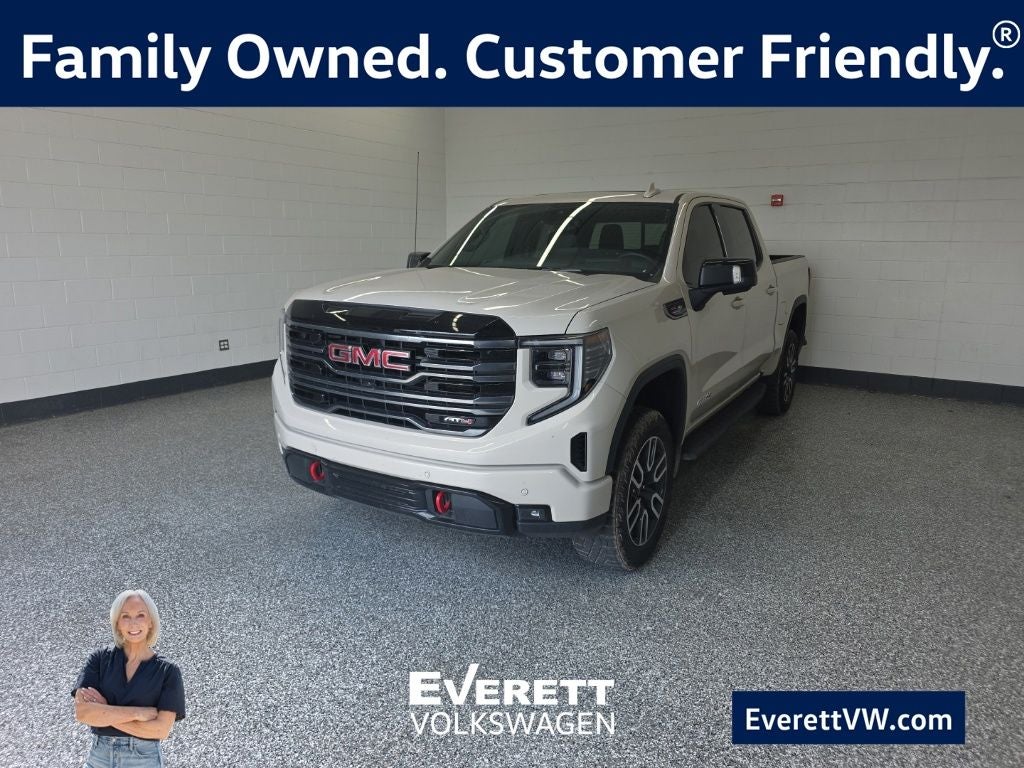 2026 GMC Sierra 1500 AT4 in Coastal Dune — front three-quarter view